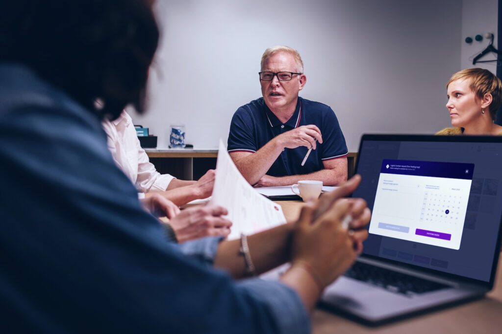 ekaizen project team meeting People using kaizen software at a team meeting